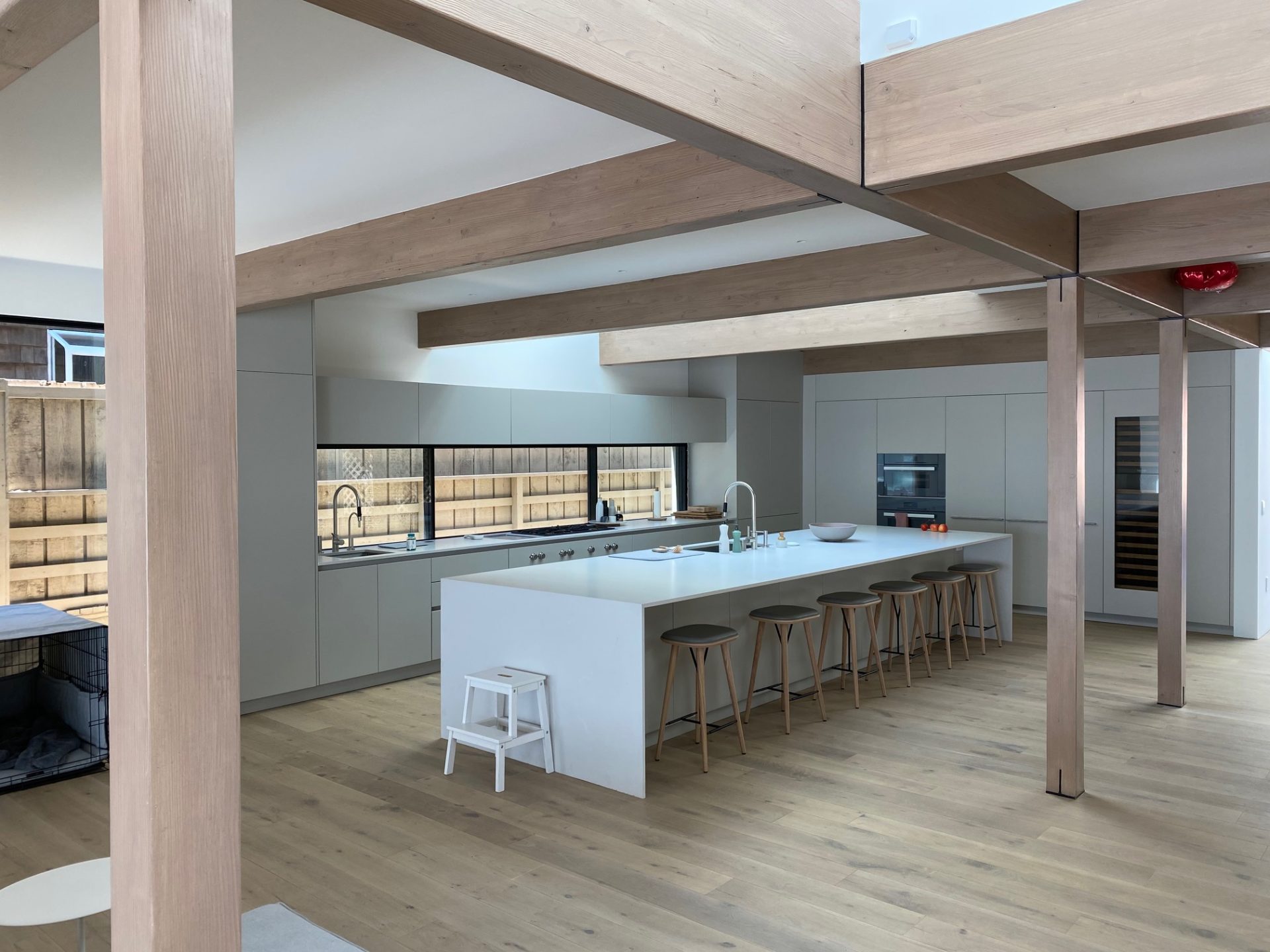 Dining room and kitchen heated and cooled via a hydronic radiant ceiling.