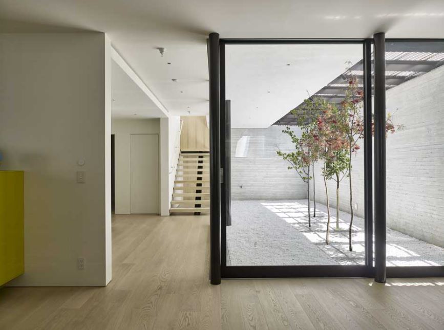 Staircase in home that utilizes a Messana Climate Control System.